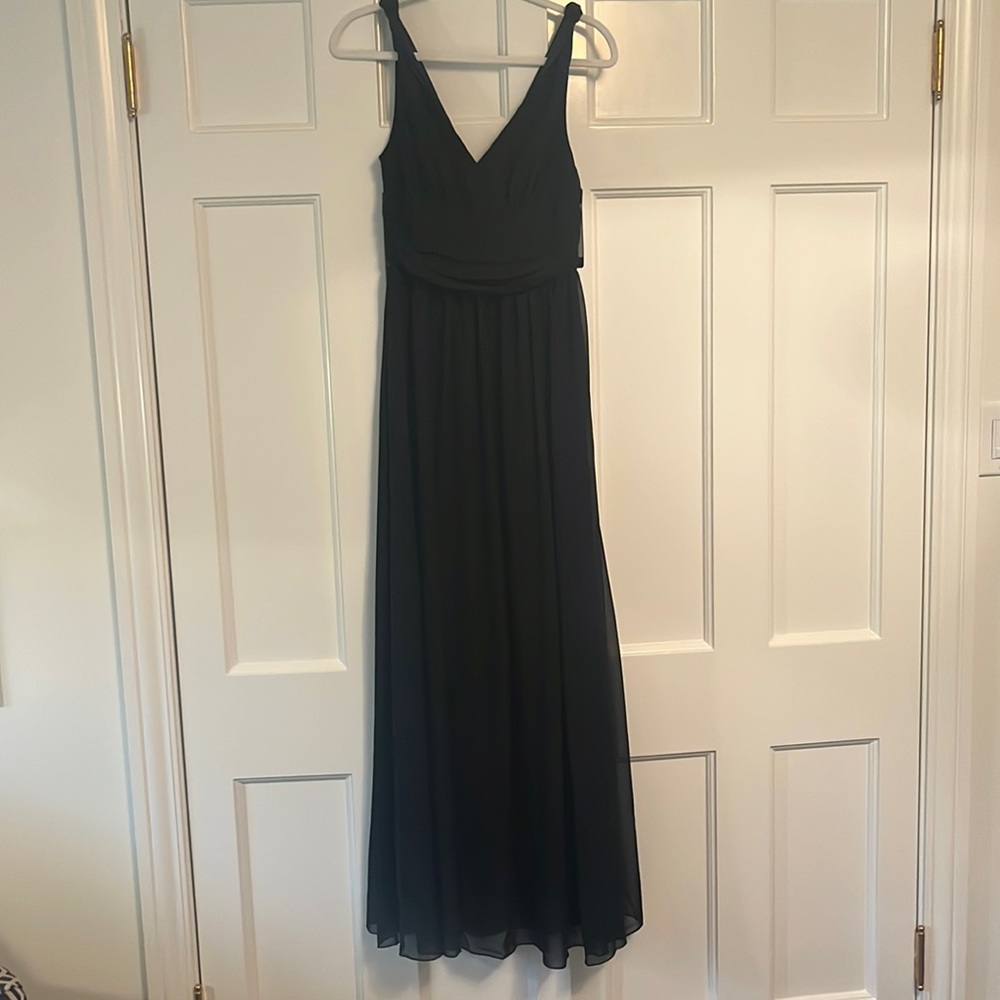 Floor length black sleeveless dress